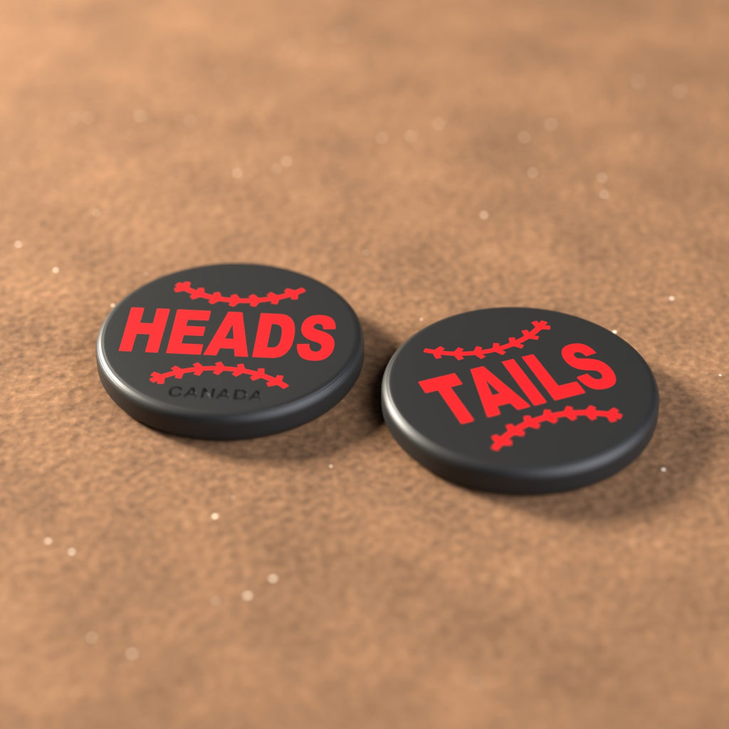 Black umpire flip coin with red lettering