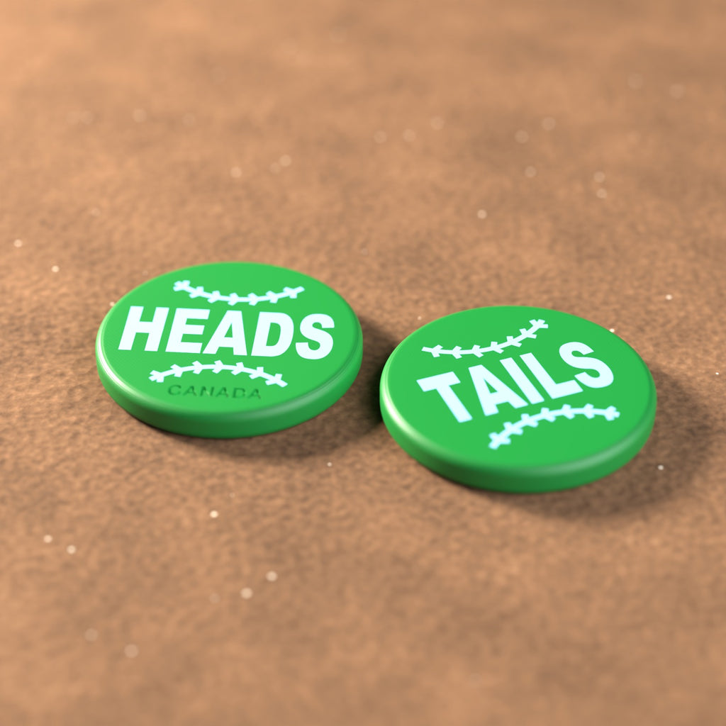 Green umpire flip coin with powder blue lettering