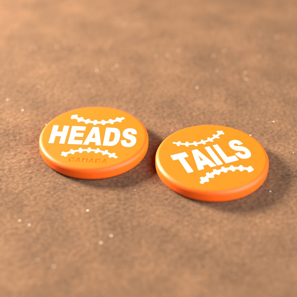 Orange umpire flip coin with white lettering